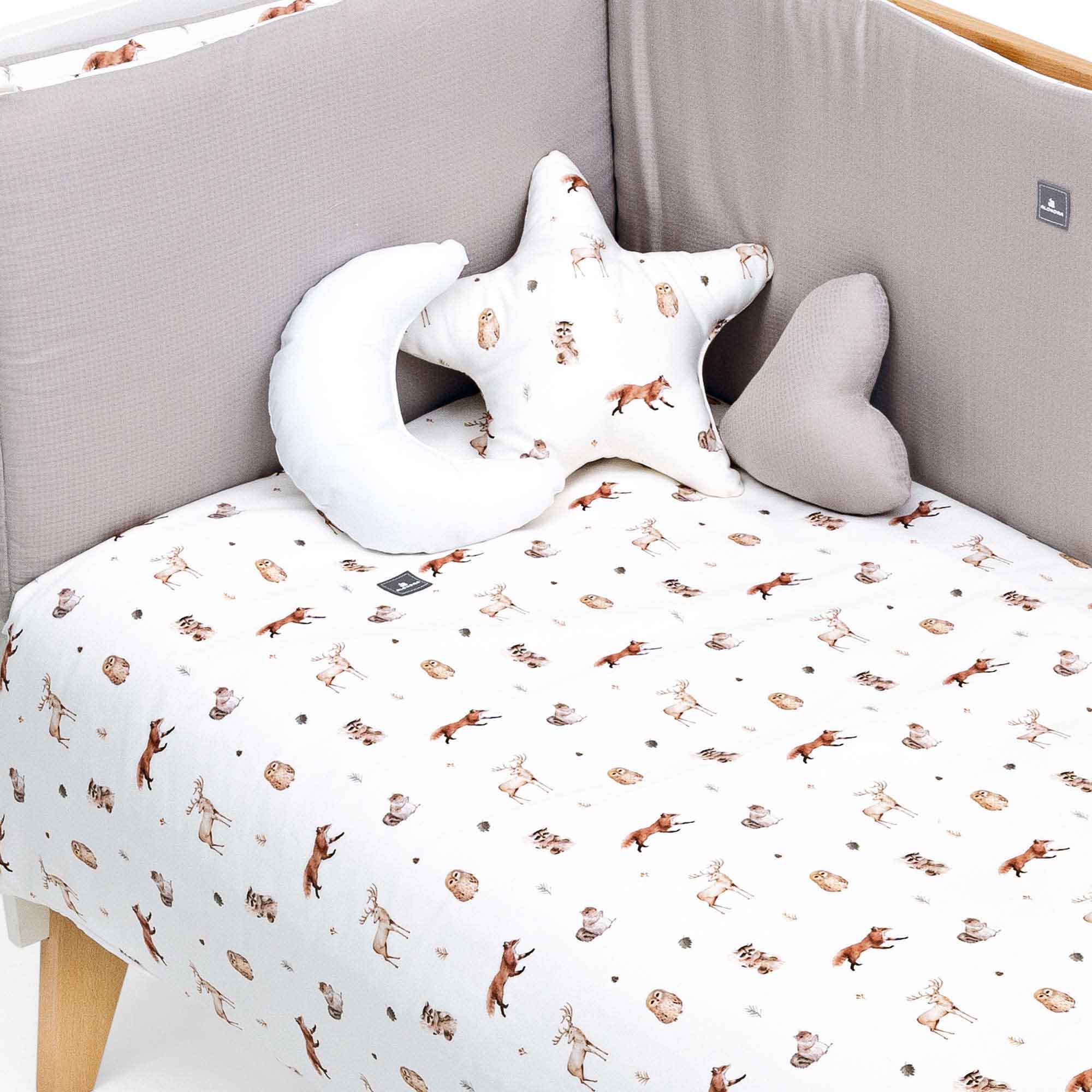 Protector cuna 70x140 cm (reversible) estampado bosque · Taiga 627-148